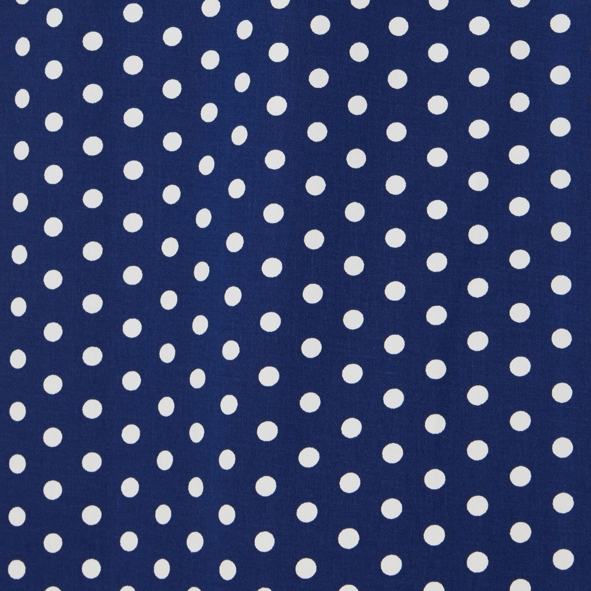 dark blue fabric, with white polka dots