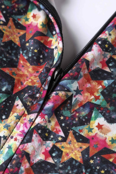 Close up view of Stars Print Long Sleeved Dress in Black