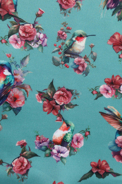 Close up View of Turquoise Hummingbird Formal Swing Dress