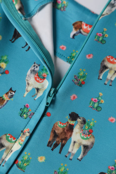 Zip view of turquoise llama cactus print