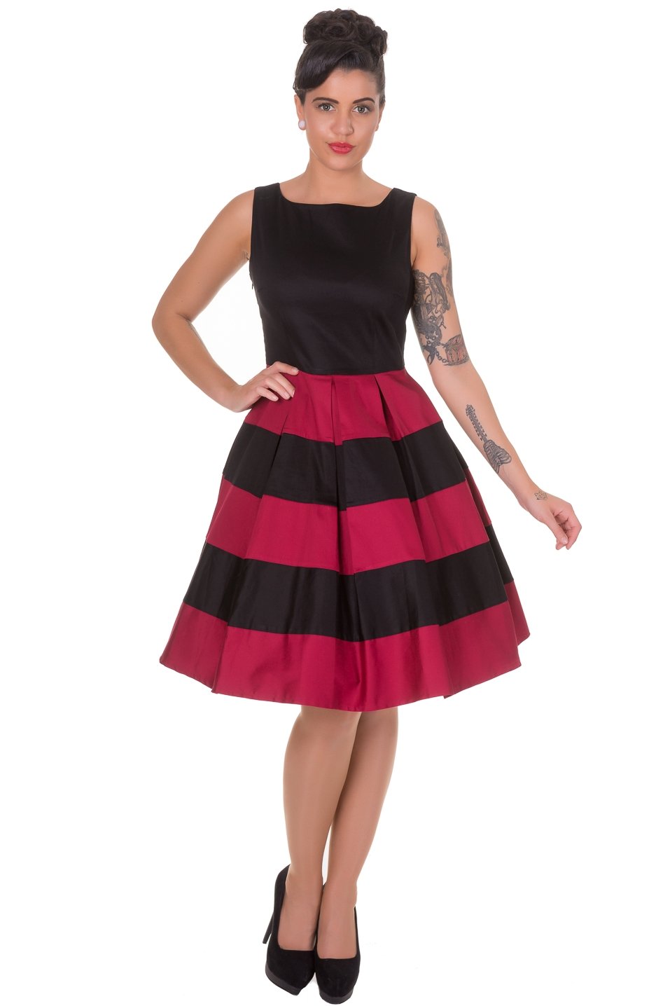 Model wearing black and red striped sleeveless dress, front view