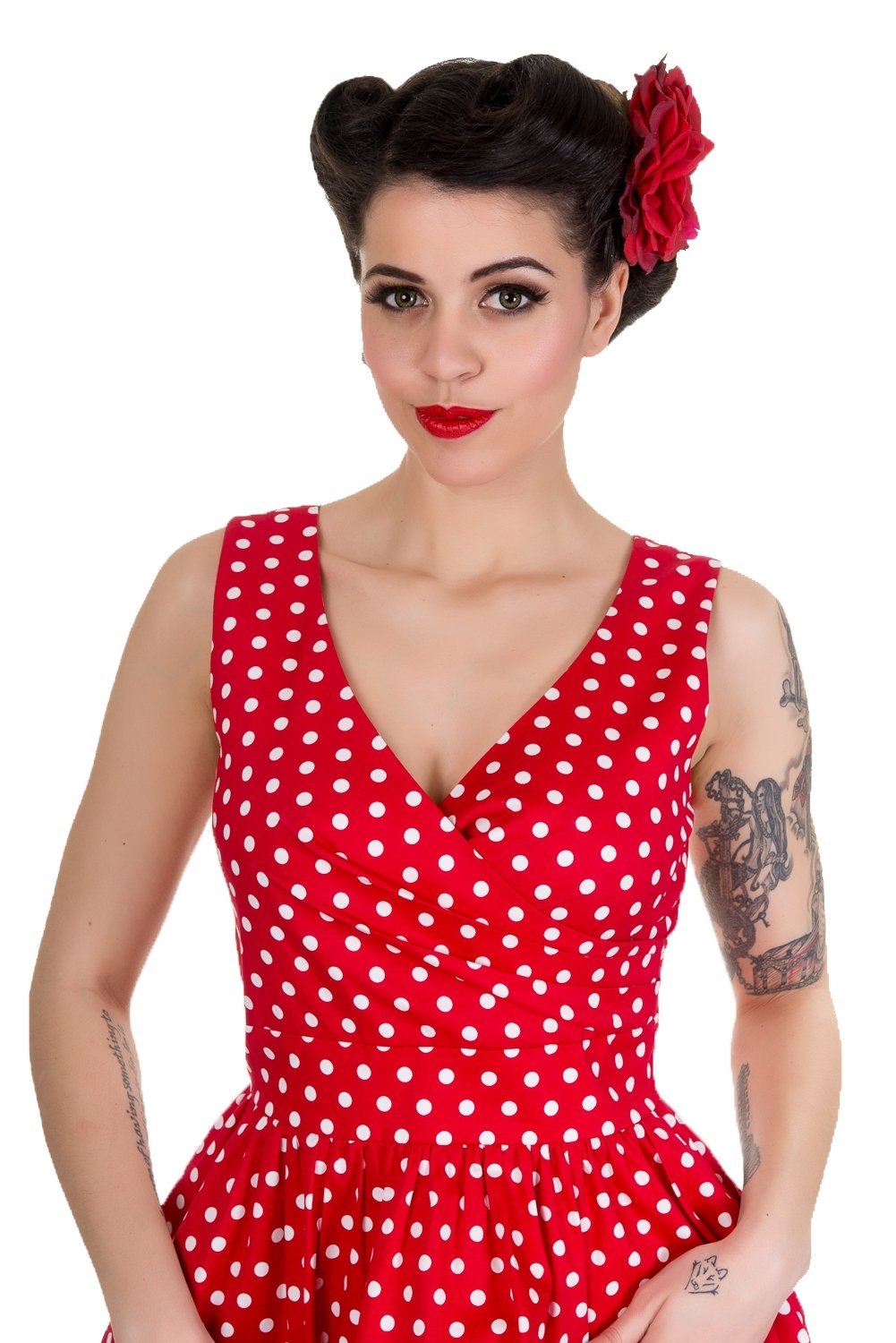 Model wearing our May crossover bust dress, in red/white polka dot print, close up view