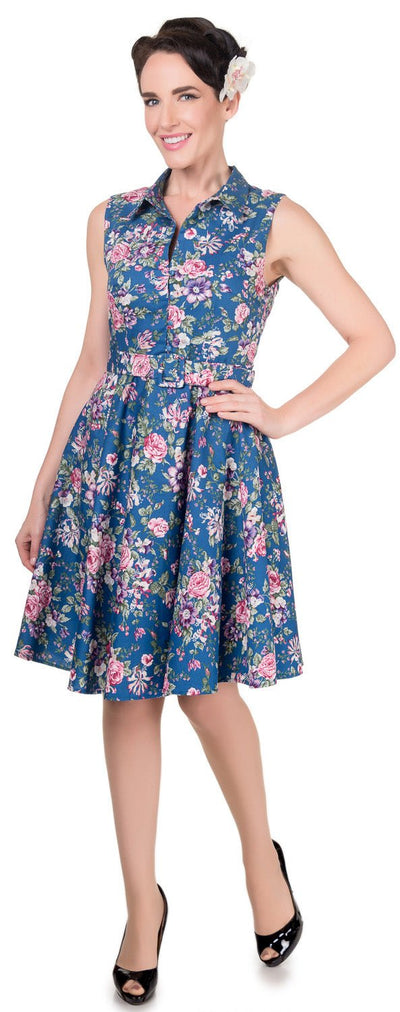 Model wearing our Poppy shirt dress in blue/pink floral print