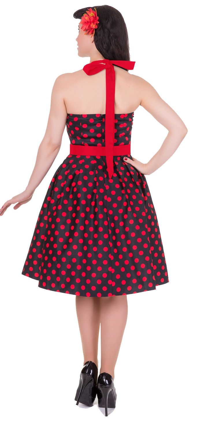 Model wearing our Sophie halterneck dress in black, with red polka dots, back view