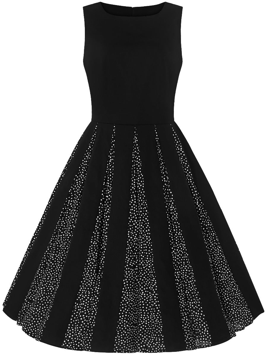 Judith sleeveless dress, in black, with white polka dots on alternate skirt panels, front view