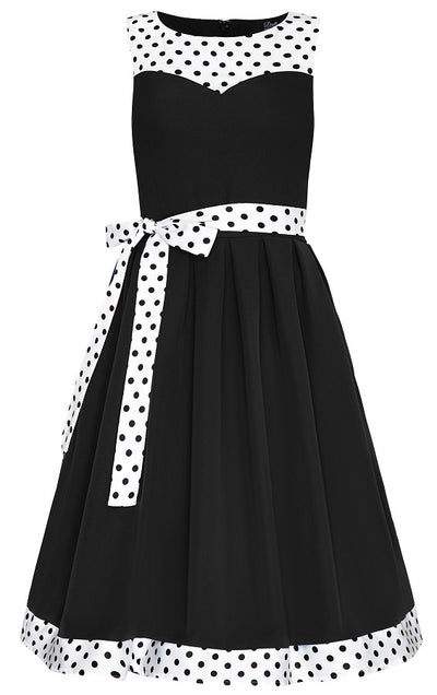 Elizabeth flared dress, in black, with white polka dot trims and belt, front view