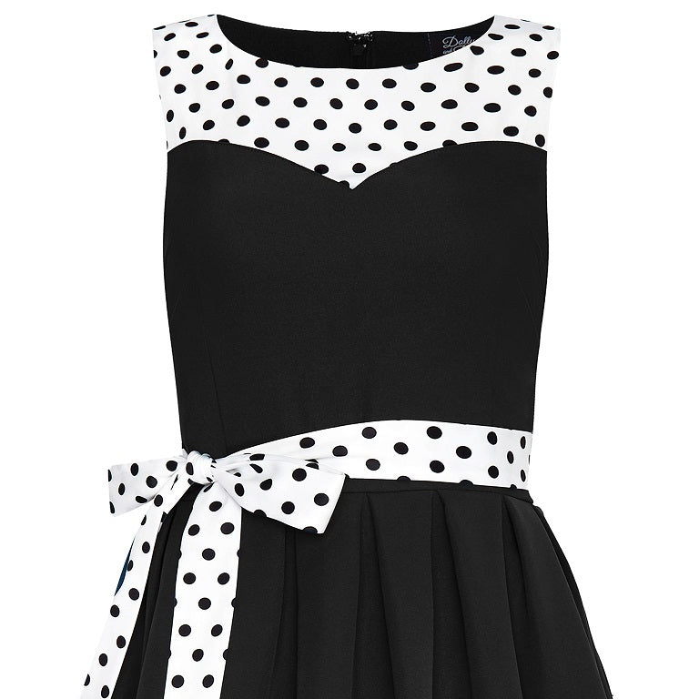 Elizabeth flared dress, in black, with white polka dot trims and belt, close up view