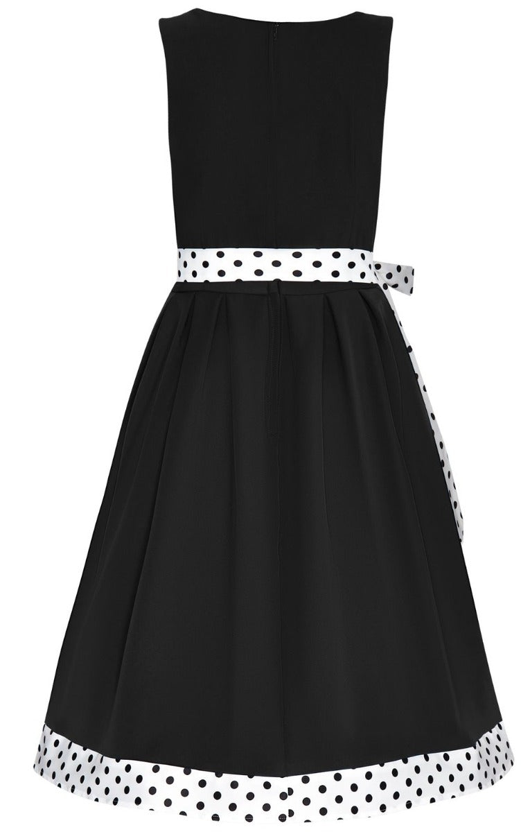 Elizabeth flared dress, in black, with white polka dot trims and belt, back view