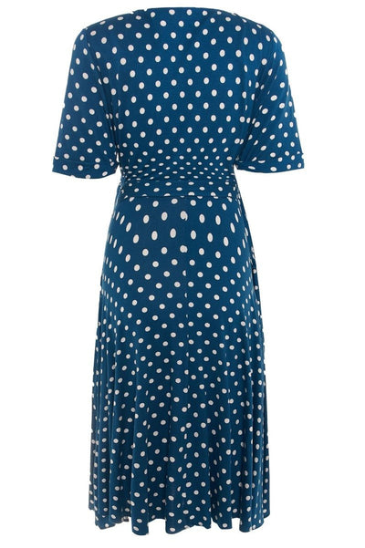 Matilda retro wrap dress, in teal blue, with white polka dots, back view
