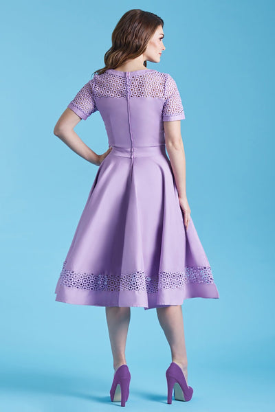 Model in lilac purple formal swing dress back view