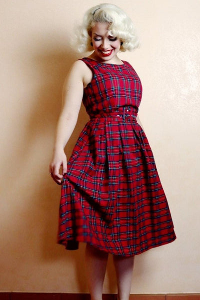 Model wearing red tartan swing dress