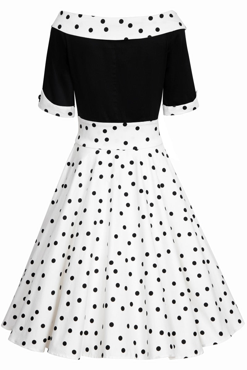 Black and white polka dot swing dress with sleeves back view