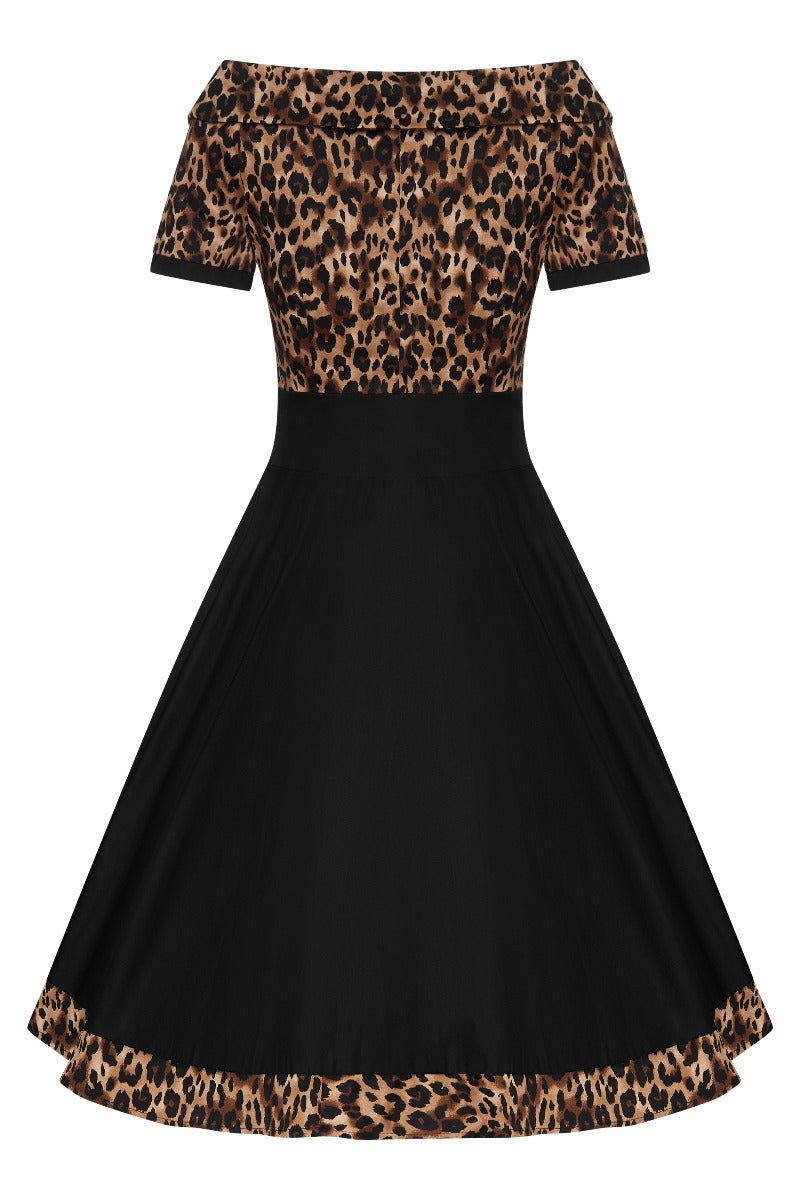 Short sleeve Darlene dress, with a brown leopard print top and black skirt, back view