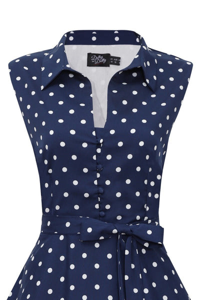 Top view of our sleeveless, shirt, swing dress, in navy blue polka dot print