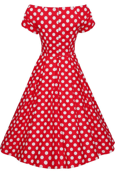 V neck, off-shoulder flared dress, in red, with white polka dots, back view
