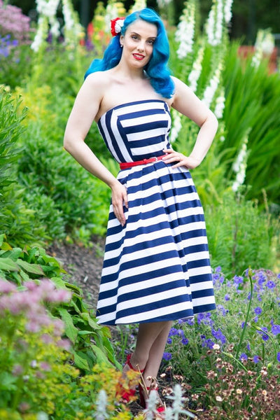 Customer in strapless bandeau white blue striped dress