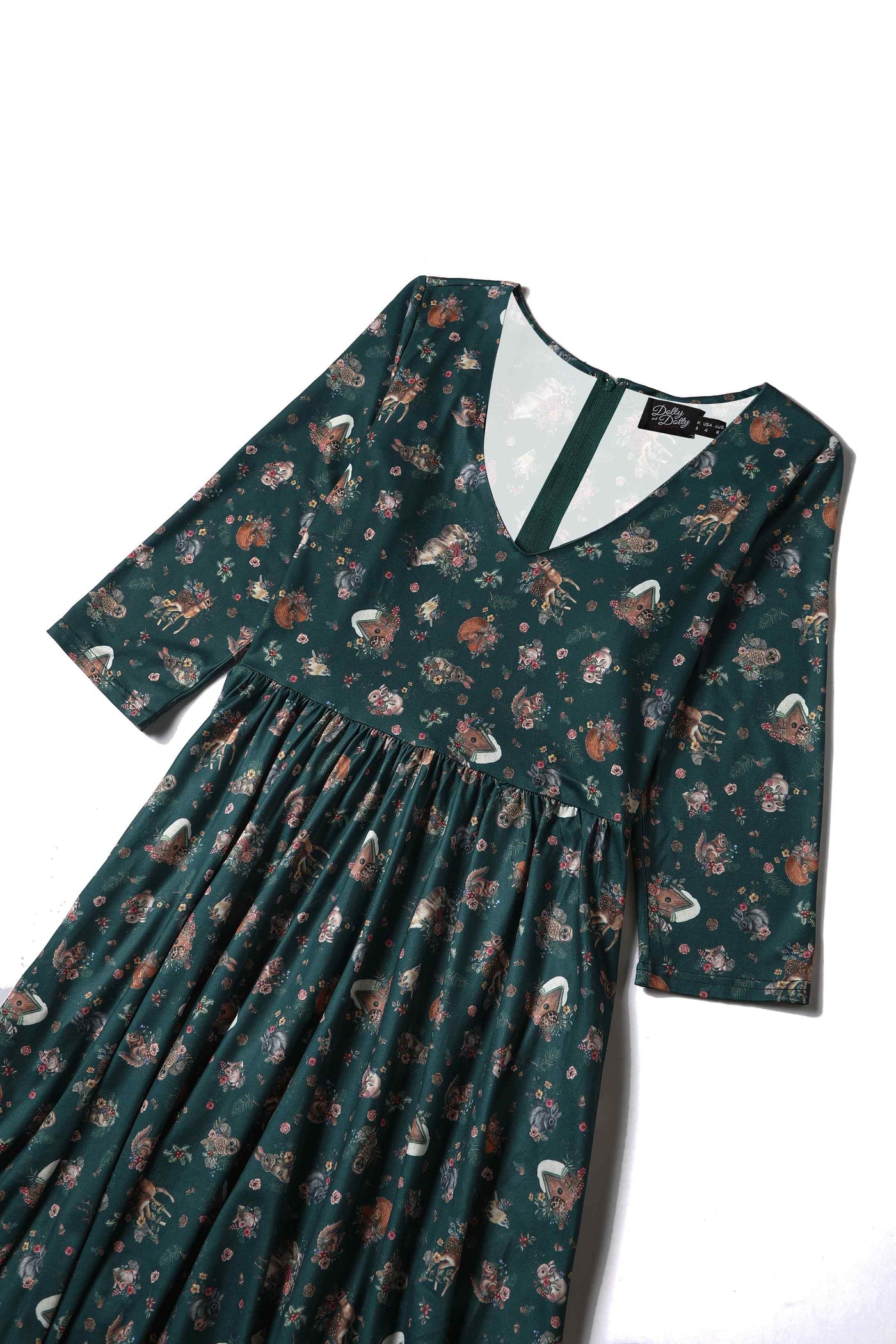 Close up view of view of Woodland Deer and Owl Dress in Green