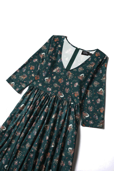 Close up view of view of Woodland Deer and Owl Dress in Green